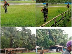 Babinsa Bersama Warga Bersihkan Lapangan Sepak Bola