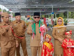 Bupati Pelalawan Hadiri Tasyakuran Hari Jadi Desa Beringin Indah