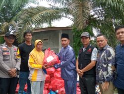 Baznas Pelalawan Salurkan Sembako untuk Korban Banjir di Kecamatan Pangkalan Kerinci