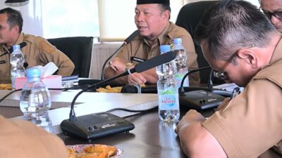 Asisten II Setda Pelalawan Hadiri Sosialisasi PMK No.10/2026 tentang DBH Sawit di Pekanbaru